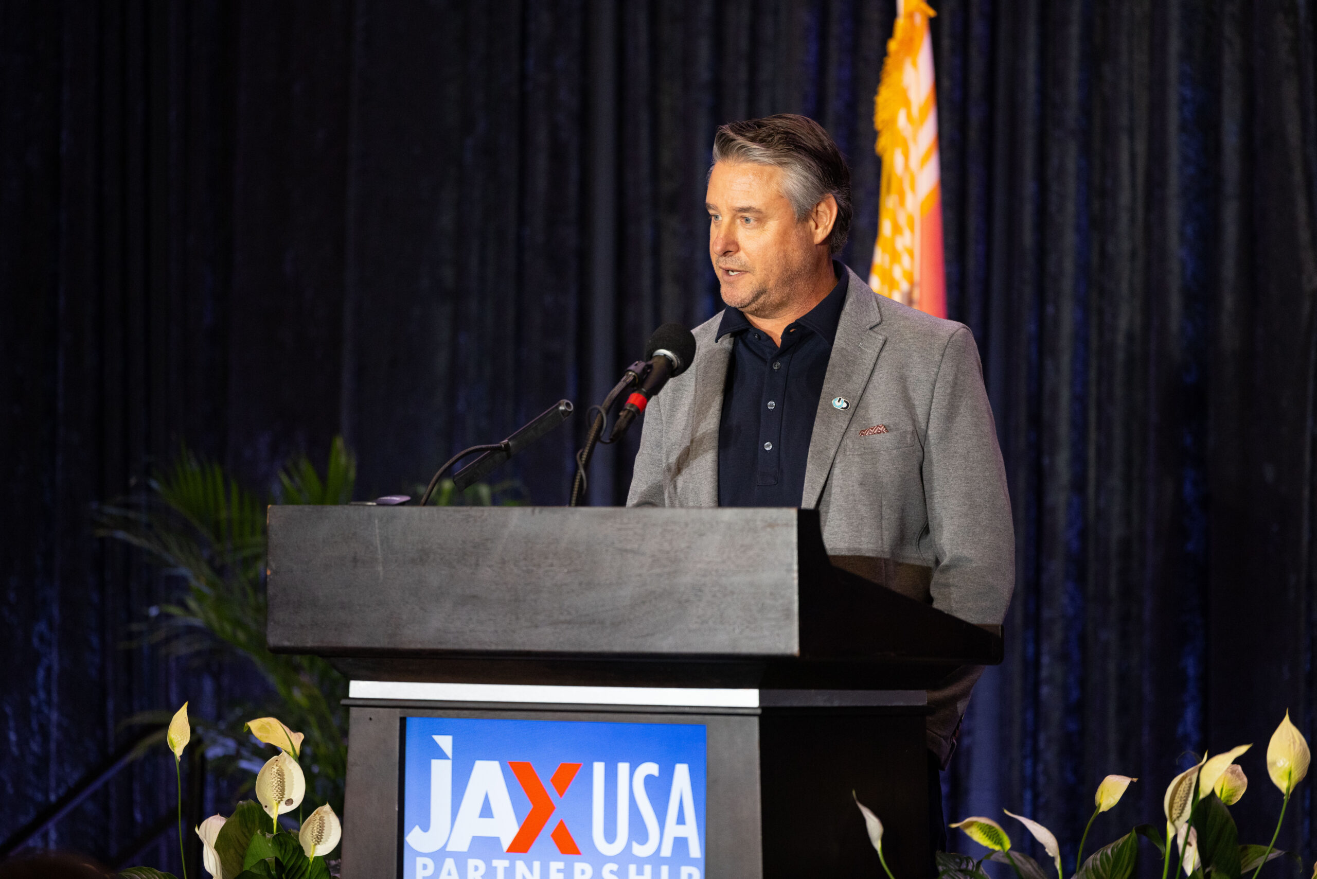 OnDefend CEO Chris Freedman accepts the 2025 JAXUSA Innovator of the Year Award at the annual JAXUSA awards banquet at the Florida Blue Conference Center in Jacksonville, Florida.
